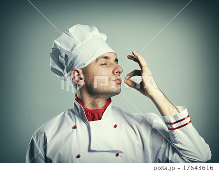 Male chef kissing fingers Male chef kissing fingers 17643616