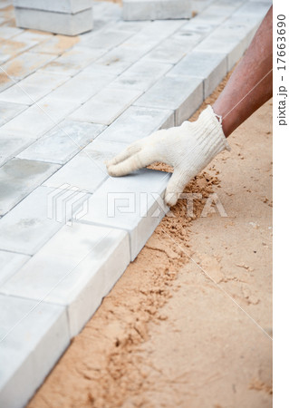 Installation of brick platform - bricks on sand 17663690