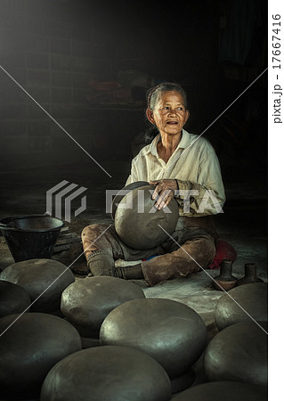 Potter  making clay pot. 17667416