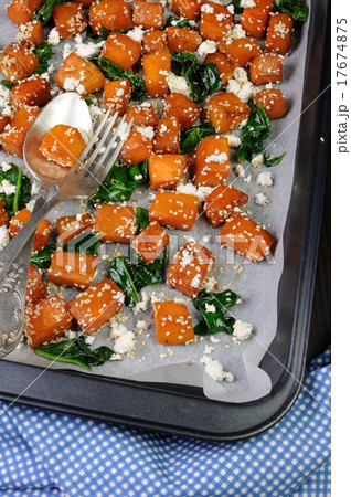 pumpkin with spinach and sesame seeds pumpkin with spinach and sesame seeds 17674875