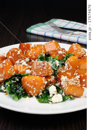 pumpkin with spinach and sesame seeds pumpkin with spinach and sesame seeds 17674876