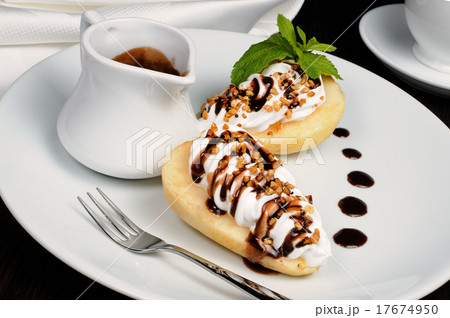 Pear with whipped cream and nuts Pear with whipped cream and nuts 17674950
