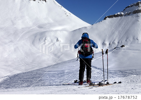 Skier on ski slope at sun day 17678752