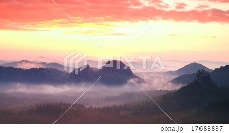 Red misty  landscape panorama in mountains. 17683837