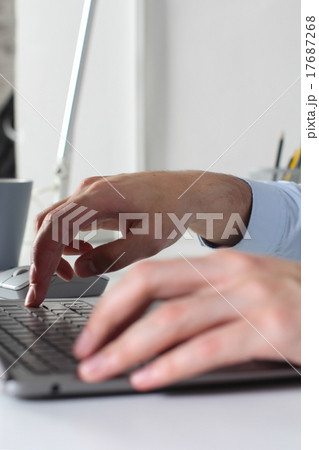 Office manager working with laptop 17687268