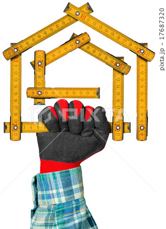 Gloved Hand Holding a Symbolic House 17687320