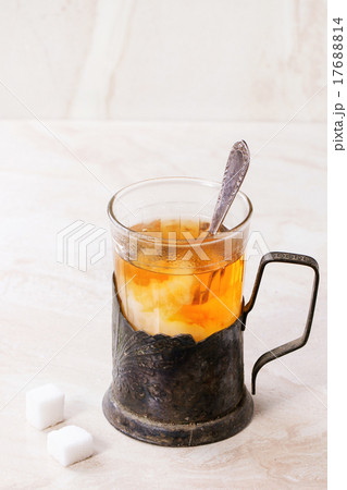 Cup of hot tea with milk 17688814