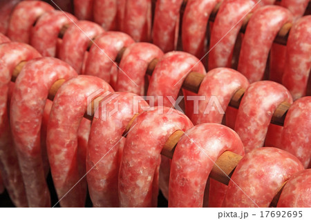 Tasty pork sausages during manufacturing process Tasty pork sausages during manufacturing process 17692695