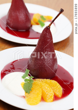 Poached pears in red wine with creme fraiche Poached pears in red wine with creme fraiche 17693899