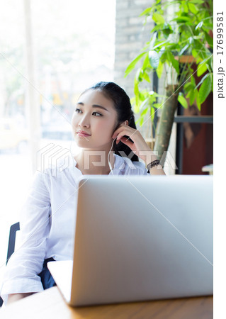 she was using a laptop computer 17699581