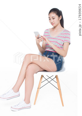 beautiful girl in the room to play the game 17699654