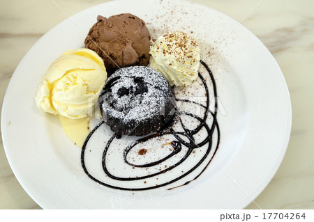 Chocolate lava cake with ice-cream in the dish 17704264