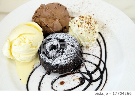 Chocolate lava cake with ice-cream in the dish 17704266