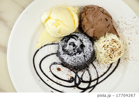 Chocolate lava cake with ice-cream in the dish 17704267