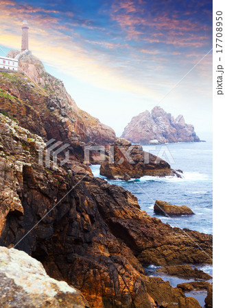 Ocean rocky coast with lighthouse 17708950