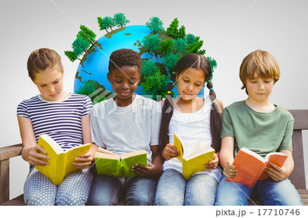 Composite image of children reading books at park 17710746