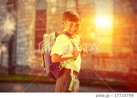 Composite image of cute pupil walking to the school bus Composite image of cute pupil walking to the school bus 17710799