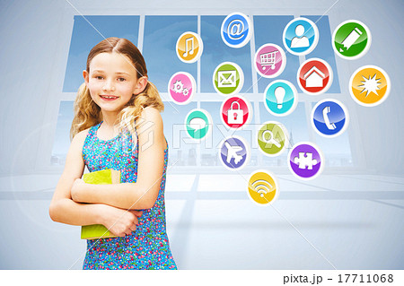 Composite image of girl holding book in library Composite image of girl holding book in library 17711068