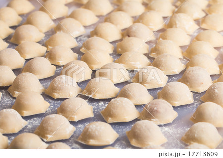 Homemade raw pastry dumplings with meat filling Homemade raw pastry dumplings with meat filling 17713609