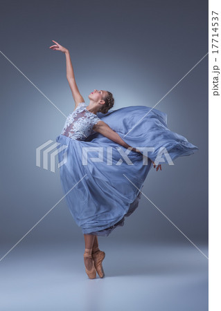 The beautiful ballerina dancing in blue long dress The beautiful ballerina dancing in blue long dress 17714537