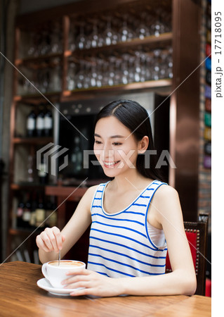 woman with coffee mug woman with coffee mug 17718095
