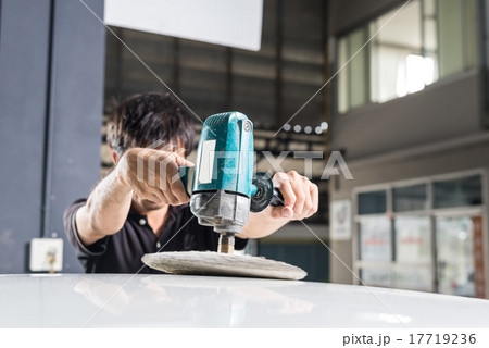 Car polishing series : Worker polishing white car Car polishing series : Worker polishing white car 17719236