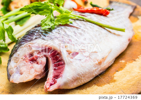 Fish on chopping block. 17724369