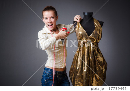 Woman tailor working on clothing Woman tailor working on clothing 17739445