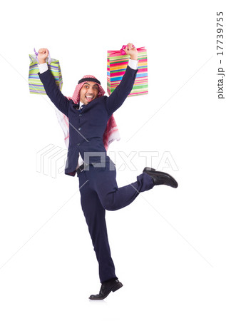 Arab man with shopping gifts on white Arab man with shopping gifts on white 17739755