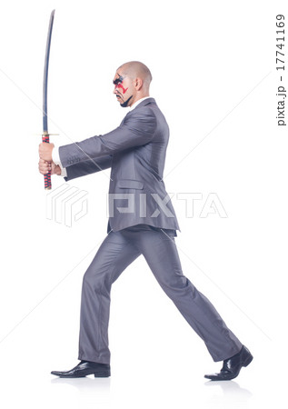 Businessman with sword isolated on white 17741169