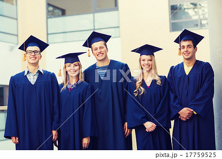 group of smiling students in mortarboards group of smiling students in mortarboards 17759525