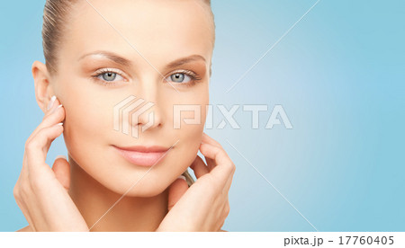 beautiful young woman touching her face 17760405