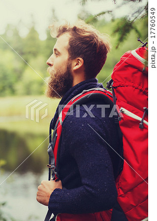smiling man with beard and backpack hiking smiling man with beard and backpack hiking 17760549