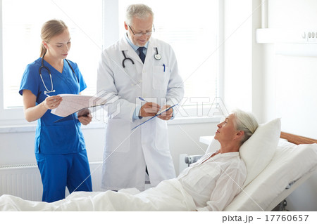 doctor and nurse visiting senior woman at hospital doctor and nurse visiting senior woman at hospital 17760657