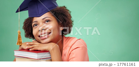 happy african bachelor girl with books at school happy african bachelor girl with books at school 17761161