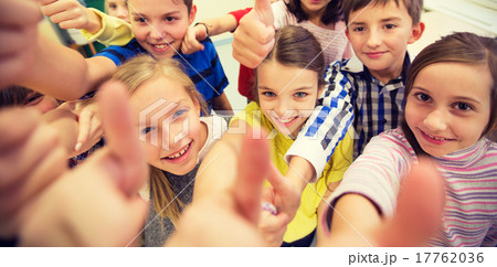 group of school kids showing thumbs up group of school kids showing thumbs up 17762036