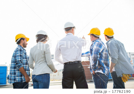 group of builders and architects at building site group of builders and architects at building site 17762190