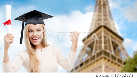 student in trencher with diploma over eiffel tower student in trencher with diploma over eiffel tower 17762573