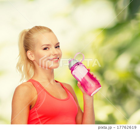 smiling sporty woman with water bottle smiling sporty woman with water bottle 17762619