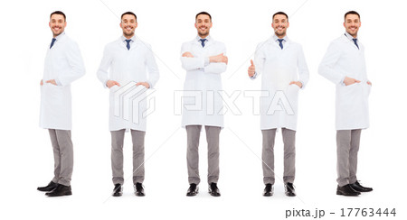 happy doctors with stethoscope showing thumbs up happy doctors with stethoscope showing thumbs up 17763444