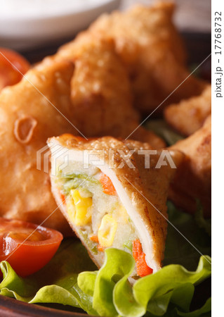 Vegetarian Indian samosa pastry macro. Vertical Vegetarian Indian samosa pastry macro. Vertical 17768732