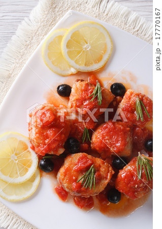 fish with olives and tomato vertical top view fish with olives and tomato vertical top view 17770167