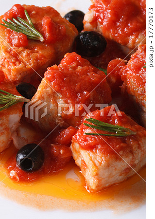 sea fish in tomato sauce with olives macro  17770173