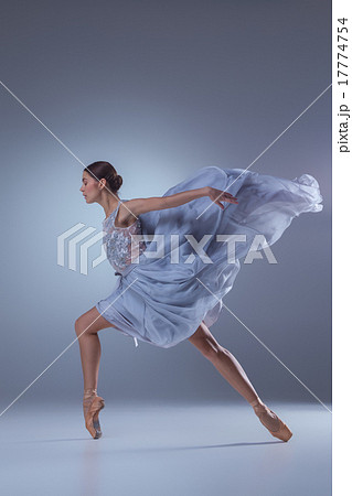 The beautiful ballerina dancing in blue long dress The beautiful ballerina dancing in blue long dress 17774754