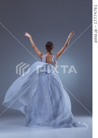 The beautiful ballerina dancing in blue long dress 17774761