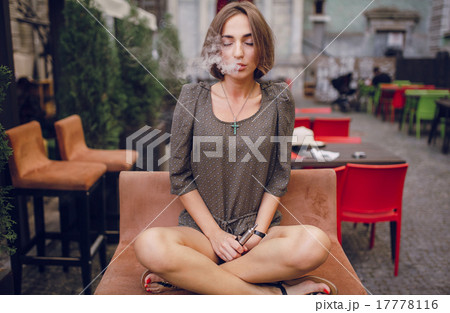 girl with E-cigarette girl with E-cigarette 17778116