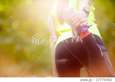 woman exercising with bent leg woman exercising with bent leg 17778362