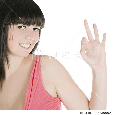 picture of young brunette showing ok sign over 17780002
