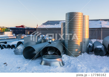 Ventilation pipes on site at winter evening Ventilation pipes on site at winter evening 17780162