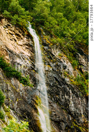 Thin water stream flowing from rocky slope of Thin water stream flowing from rocky slope of 17793664